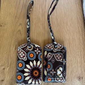 Vera Bradley luggage tags.